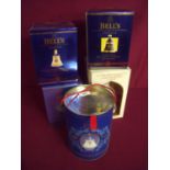 Five cased Bells commemorative whisky decanters (sealed and full) including The Prince of Wales 50th