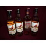 Four 1ltr bottles of Famous Grouse Whisky