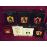 Group of seven boxed Bells Whisky Christmas decanter sets (full & sealed) including 1992, 1993,