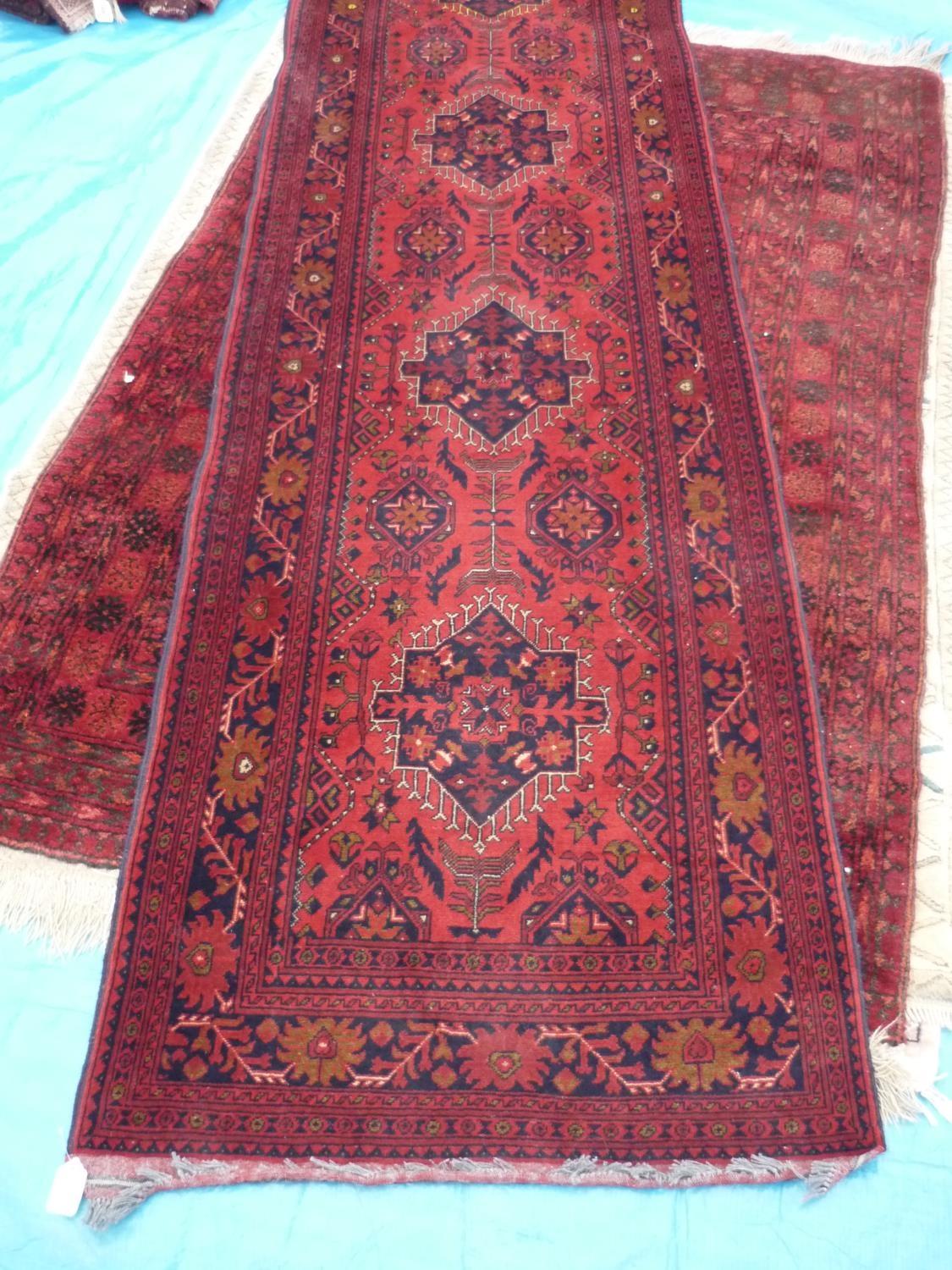 Persian type red ground runner (295cm x 87cm)