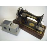 Oak cased Singer sewing machine and a vintage Halina 150 Projector (2)