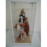 Glazed cased figure of a Geisha girl (32cm x 25cm x 68cm)