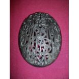 Large Victorian carved convex oval Whitby Jet book cover panel depicting all letters of the alphabet