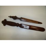 19th/20th C carved oak Black Forest style page turner and similar letter opener, the pummel carved