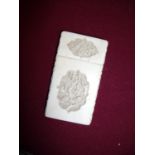 Late 19th C Chinese carved ivory card case with central carved panels and further floral detail to