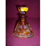 Large clear and amber etched glass scent bottle of square tapering form depicting a stag in woodland