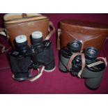 Tan leather cased pair of Yashica 7x50 Field 7.1 binoculars and a leather cased set of Swift Audubon