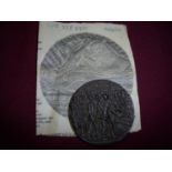 Lusitania medal with associated newspaper cutting