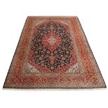 Property of a gentleman - a modern Persian Tabriz woollen hand-made carpet with navy field, 158 by