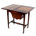 Property of a lady - an Edwardian rosewood & inlaid combined games & work table, the swivel foldover