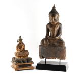 Property of a lady - a carved wood figure of a seated Buddha, mounted on a modern black stand, 19.