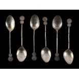 A set of six Chinese silver teaspoons, late 19th / early 20th century, with stylised coin finials (