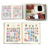 Property of a deceased estate - an album & box containing a small stamp collection (2).