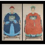 A pair of Chinese ancestor paintings on paper, 19th century, unframed, the paintings 64.15 by 35.