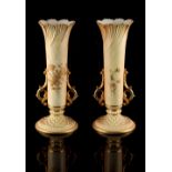 Property of a gentleman - a pair of late Victorian Royal Worcester blush ivory spill vases,