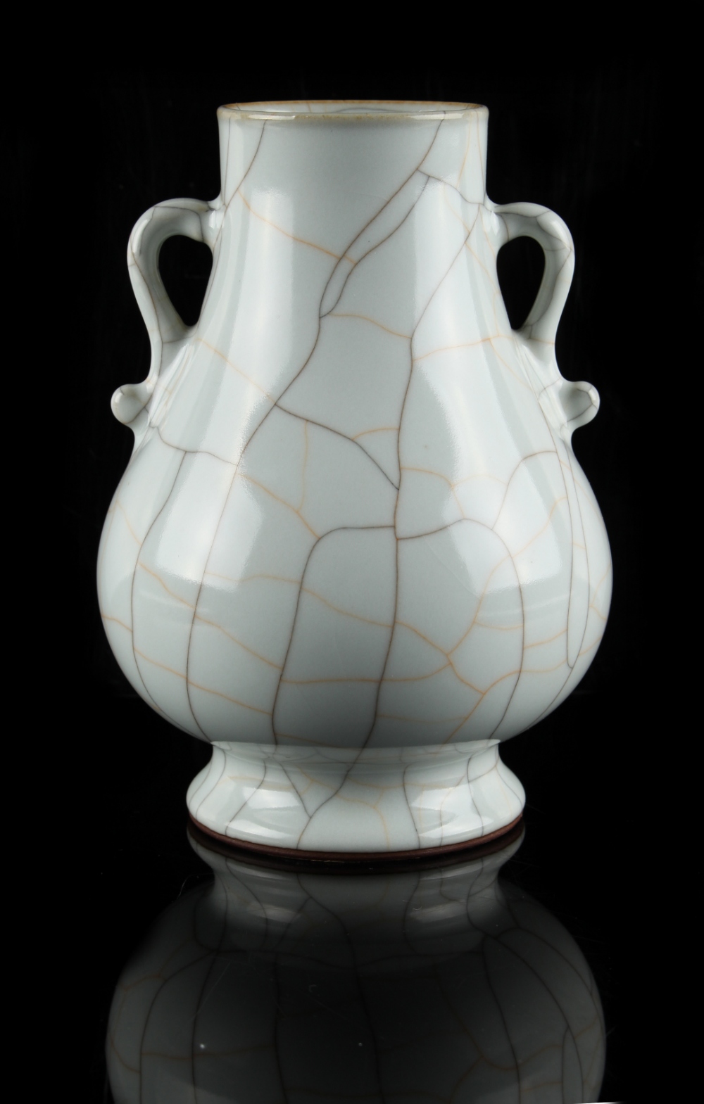 A Chinese guan type two-handled vase, hu, probably late 20th century, 7ins. (17.8cms.) high (see