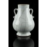 A Chinese guan type two-handled vase, hu, probably late 20th century, 7ins. (17.8cms.) high (see