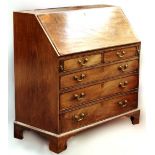 Property of a deceased estate - a George III mahogany fall front bureau, with fitted interior