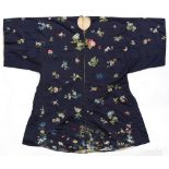An early 20th century Chinese embroidered navy blue silk robe decorated with scattered butterflies &