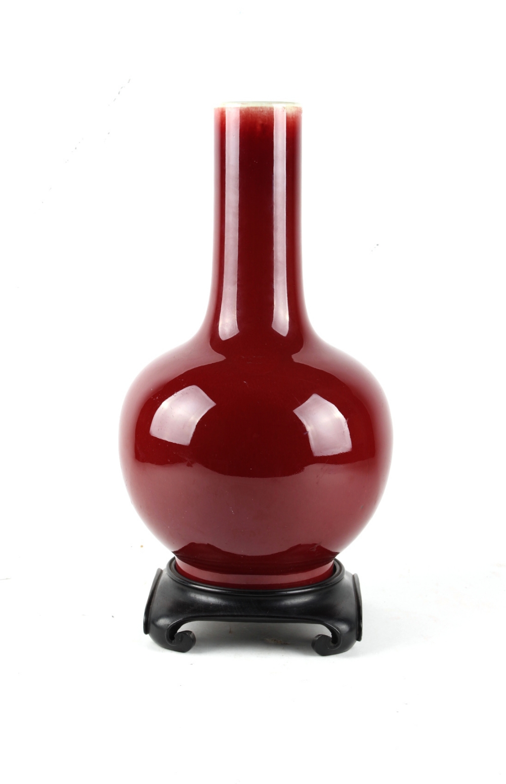 A Chinese sang de boeuf glazed bottle vase, 19th century, the base drilled for use as a table