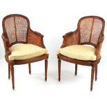 Property of a gentleman - a pair of early 20th century French Louis XVI style carved beechwood &