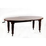 Property of a gentleman - an Edwardian mahogany telescopic extending dining table with extra