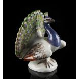 Property of a lady - a small Meissen model of a peacock, blue crossed swords mark, 2.25ins. (5.