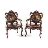 A good pair of late 19th century Chinese carved & mother-of-pearl inlaid elbow chairs, each with