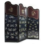 A late 19th / early 20th century carved three-fold screen with Chinese embroidered silk panels, 71.
