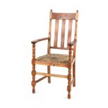 Property of a deceased estate - a hand-made oak carver chair, with drop-in seat.