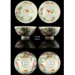 A pair of Chinese famille rose peaches & bats bowls, each with an underglaze blue Yongzheng 6-