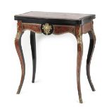 Property of a lady - a 19th century French Boulle style swivel-top foldover card table, with