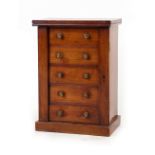 Property of a gentleman - a Victorian walnut table top Wellington chest, with locking side bar &