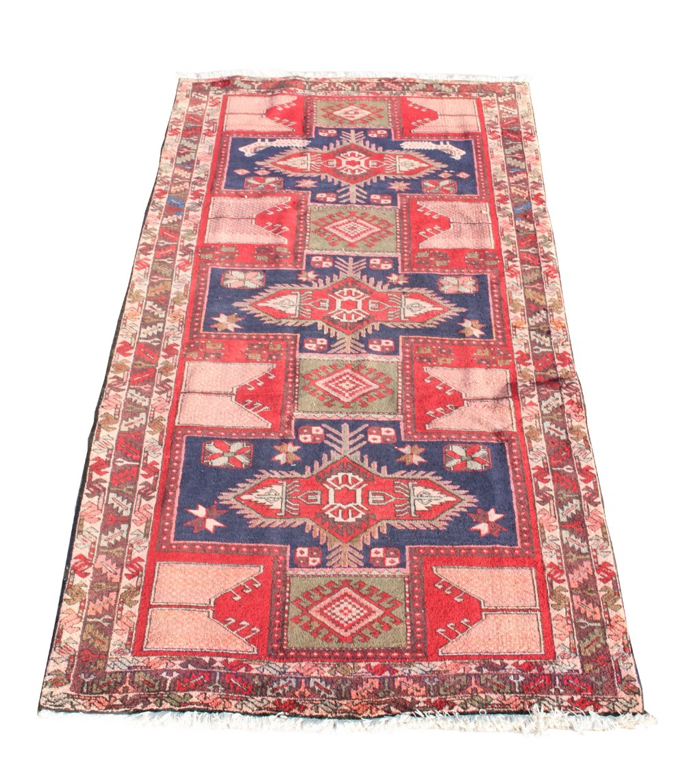 An Arbedil woollen hand-made runner with geometric design, 126 by 57ins. (320 by 145cms.) (see