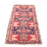 An Arbedil woollen hand-made runner with geometric design, 126 by 57ins. (320 by 145cms.) (see