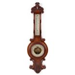 Property of a deceased estate - a late Victorian carved walnut aneroid barometer & thermometer, 26.