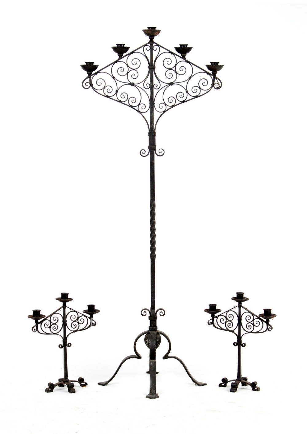 Property of a deceased estate - an ornate wrought iron floor standing five-light candelabrum;