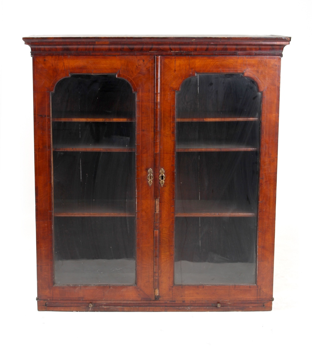Property of a gentleman - an early 18th century walnut & boxwood strung glazed two-door bookcase top