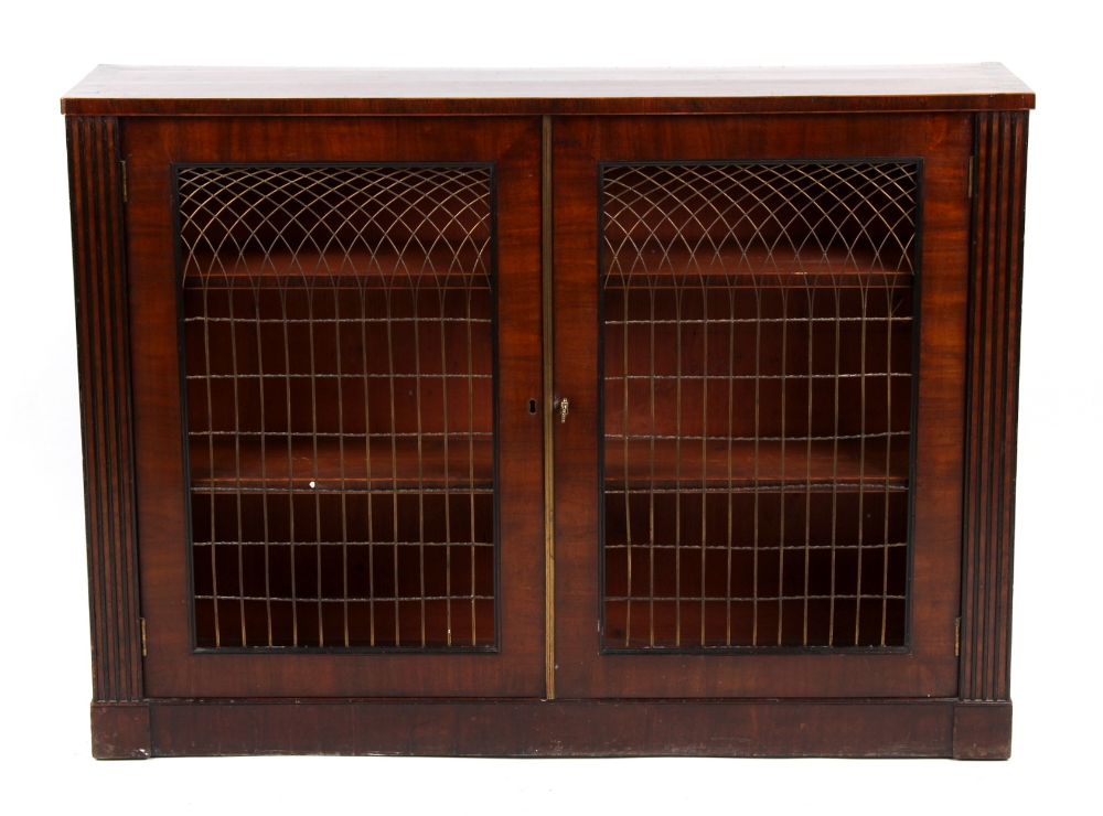 Property of a lady of title - a mahogany & rosewood banded dwarf bookcase with brass grilles,