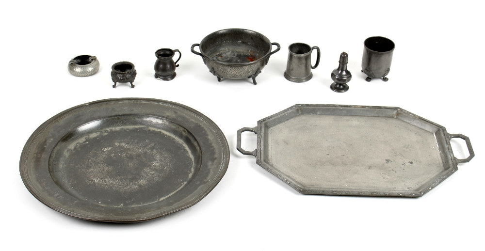 Property of a deceased estate - a group of nine pewter items including a large charger, 20.2ins. (