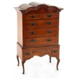 Property of a lady - a miniature or apprentice tallboy or chest-on-stand, in early 18th century