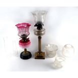 Property of a gentleman - a Victorian oil lamp with pink moulded vaseline glass reservoir;