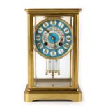 Property of a gentleman - a late 19th century French brass four glass clock, the Sevres style floral