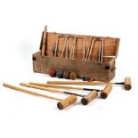 Property of a lady of title - a wooden boxed croquet set (see illustration).