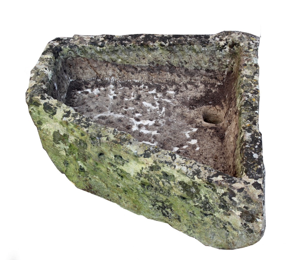 Property of a deceased estate - a well-weathered stone corner sink or trough (see illustration).