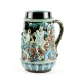 Property of a lady - a late 19th / early 20th century Continental majolica mug or tankard, decorated