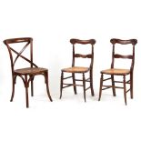 Property of a lady of title - a pair of 19th century faux coromandel bedroom chairs, with cane