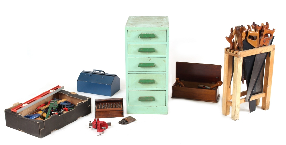 Property of a deceased estate - a small green painted chest of drawers containing various hand