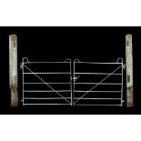 Property of a lady of title - a pair of white painted wrought iron drive-way gates, with posts,
