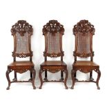 Property of a lady - a set of three 19th century Continental carved walnut & cane panelled high back